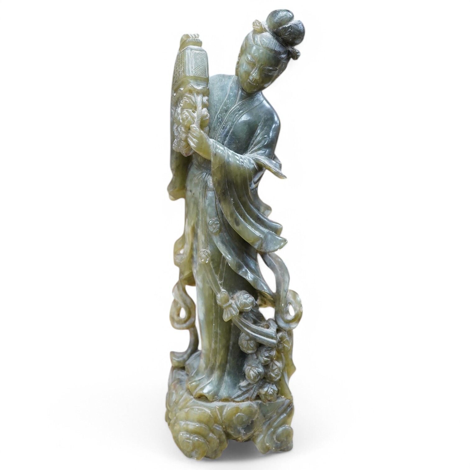 A Chinese carved green soapstone figure of Guanyin, 34cm high. Condition - fair to good